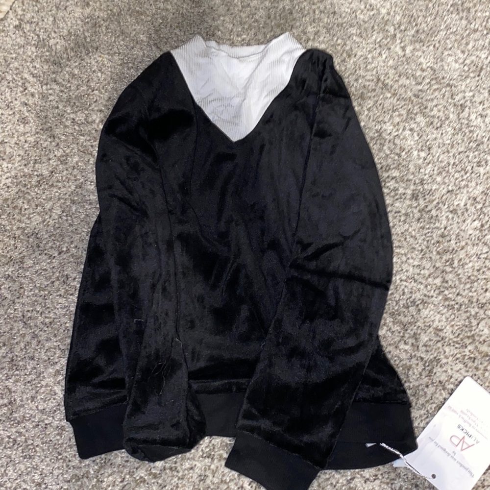 Girls size 8 sweater with white around neck